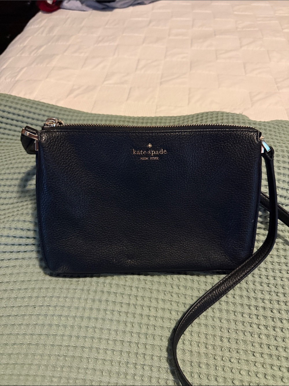 kate spade black leather crossbody with gold logo
